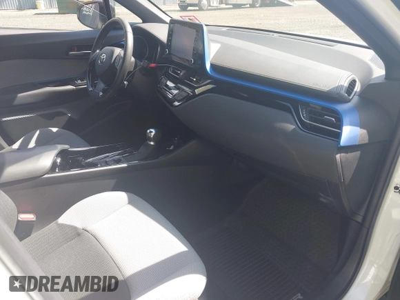 2019 Toyota C-HR XLE with VIN NMTKHMBX5KR097682, listed as a IAAI auction lot 42145372 with 11,003 mi miles and . Bid and sale history available at DreamBid. Image 5.