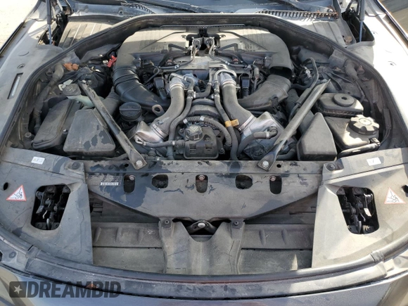2012 BMW 7 Series 750i with VIN WBAKA8C58CDS99694, listed as a Copart auction lot 46828435 with 131,458 mi miles and Salvage title. Bid and sale history available at DreamBid. Image 11.