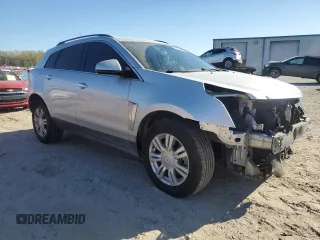 2014 Cadillac SRX with VIN 3GYFNAE36ES680324, listed as a Copart auction lot 50034625 with 150,014 mi miles and Salvage Title. Bid and sale history available at DreamBid. Image 4.