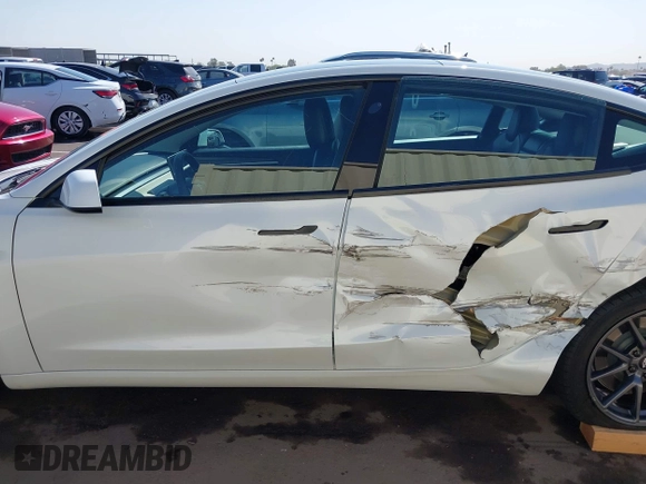 2021 Tesla Model 3 Long Range z VIN 5YJ3E1EB9MF006966, wystawiony jako IAAI lot #41976745 z przebiegiem 37 651 mil mil oraz . Historia ofert i sprzedaży dostępna na DreamBid. Obrazek 14.
