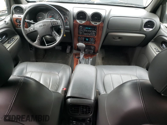 2004 GMC Envoy SLT with VIN 1GKDT13S942279670, listed as a Copart auction lot 73527974 with 120,425 mi miles and Salvage Title. Bid and sale history available at DreamBid. Image 8.