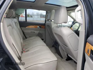 2011 Lincoln MKX z VIN 2LMDJ8JK9BBJ26324, wystawiony jako Copart lot #55482985 z przebiegiem Nie podano mil oraz Szkoda całkowita • Salvage title. Historia ofert i sprzedaży dostępna na DreamBid. Obrazek 11.