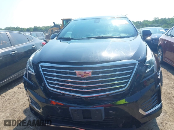 2017 Cadillac XT5 Platinum AWD with VIN 1GYKNFRS6HZ130626, listed as a IAAI auction lot 42470536 with 128,129 mi miles and . Bid and sale history available at DreamBid. Image 12.