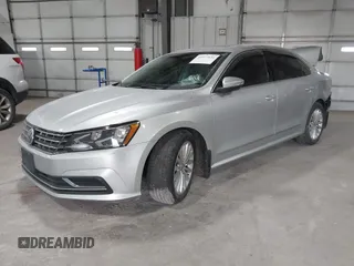 2016 Volkswagen Passat SE z VIN 1VWBT7A37GC027073, wystawiony jako IAAI lot #41073634 z przebiegiem 72 563 mil mil oraz . Historia ofert i sprzedaży dostępna na DreamBid. Obrazek 2.