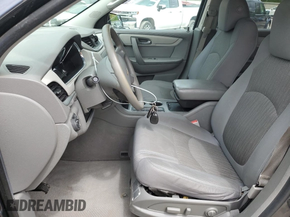 2014 Chevrolet Traverse LS z VIN 1GNKVFKD8EJ269403, wystawiony jako Copart lot #56546145 z przebiegiem 174 019 mil mil oraz Szkoda całkowita • Salvage title. Historia ofert i sprzedaży dostępna na DreamBid. Obrazek 7.