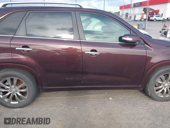 2011 Kia Sorento SX with VIN 5XYKW4A28BG127753, listed as a IAAI auction lot 42033754 with 163,470 mi miles. Bid and sale history available at carsss.com. Image 16.