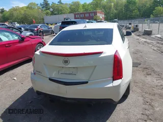 2013 Cadillac ATS with VIN 1G6AG5RX5D0178136, listed as a IAAI auction lot 42220395 with 147,066 mi miles and . Bid and sale history available at DreamBid. Image 16.