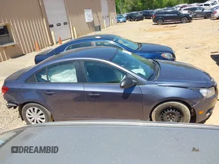 2014 Chevrolet Cruze LS with VIN 1G1PA5SG2E7166403, listed as a IAAI auction lot 42066938 with 124,181 mi miles and . Bid and sale history available at DreamBid. Image 13.