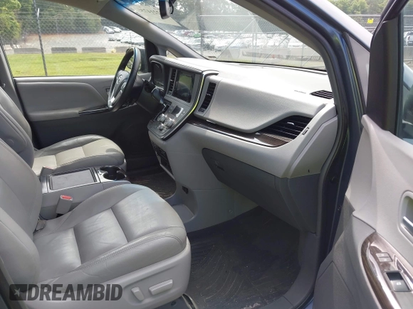 2016 Toyota Sienna XLE with VIN 5TDYK3DC0GS766059, listed as a IAAI auction lot 42214738 with 143,001 mi miles and . Bid and sale history available at DreamBid. Image 5.