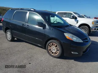 2009 Toyota Sienna XLE with VIN 5TDZK22C59S235573, listed as a IAAI auction lot 40885143 with 62,949 mi miles. Bid and sale history available at carsss.com. Image 1.