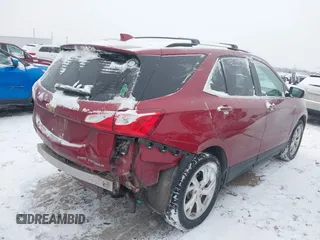 2021 Chevrolet Equinox Premier z VIN 2GNAXXEV4M6105996, wystawiony jako IAAI lot #41402065 z przebiegiem 51 083 mil mil oraz . Historia ofert i sprzedaży dostępna na DreamBid. Obrazek 4.