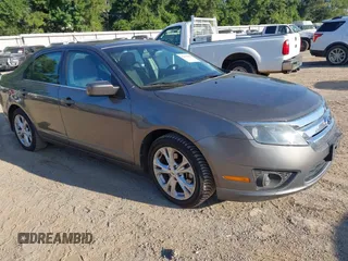 2012 Ford Fusion SE z VIN 3FAHP0HA6CR143783, wystawiony jako IAAI lot #42804682 z przebiegiem 282 185 mil mil oraz . Historia ofert i sprzedaży dostępna na DreamBid. Obrazek 1.