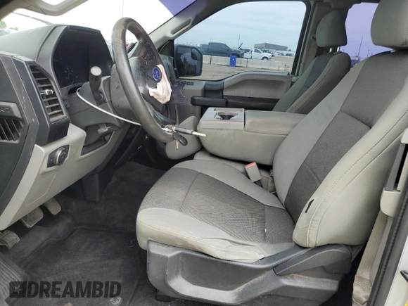 2016 Ford F-150 XLT with VIN 1FTEX1EF4GKD58611, listed as a Copart auction lot 59477825 with 196,844 mi miles and Salvage title. Bid and sale history available at DreamBid. Image 7.