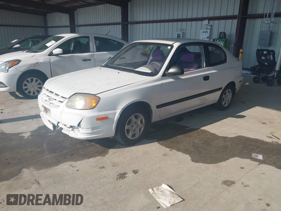 2004 Hyundai Accent with VIN KMHCF35C94U315390, listed as a IAAI auction lot 41391877 with 162,406 mi miles. Bid and sale history available at carsss.com. Image 2.