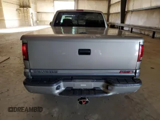 2000 GMC Sonoma SLS z VIN 1GTCS19W0Y8146125, wystawiony jako Copart lot #71576724 z przebiegiem 73 854 mil mil oraz Szkody całkowita. Historia ofert i sprzedaży dostępna na DreamBid. Obrazek 6.