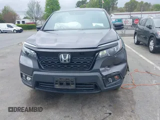 2020 Honda Passport EX-L z VIN 5FNYF8H5XLB018060, wystawiony jako IAAI lot #41961243 z przebiegiem 60 575 mil mil oraz . Historia ofert i sprzedaży dostępna na DreamBid. Obrazek 12.