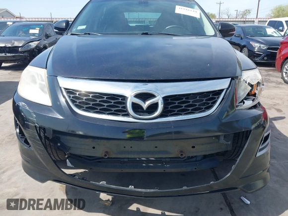 2011 Mazda CX-9 Grand Touring with VIN JM3TB3DA5B0300784, listed as a IAAI auction lot 41816110 with 138,523 mi miles and . Bid and sale history available at DreamBid. Image 6.