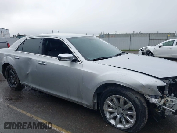 2011 Chrysler 300 Limited with VIN 2C3CA5CG9BH614354, listed as a IAAI auction lot 41216730 with 141,670 mi miles. Bid and sale history available at carsss.com. Image 14.