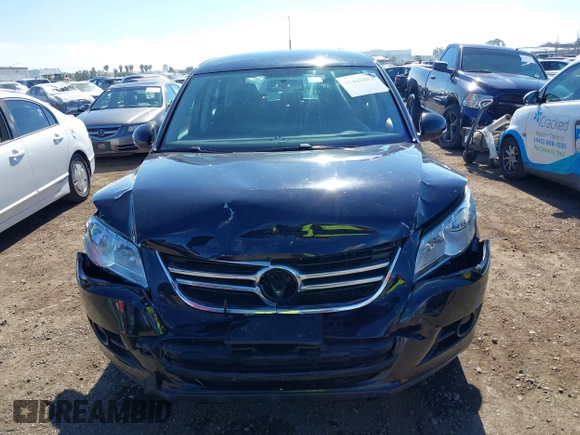 2010 Volkswagen Tiguan with VIN WVGAV9AX6AW000410, listed as a IAAI auction lot 41446852 with 118,728 mi miles and . Bid and sale history available at DreamBid. Image 6.