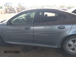 2005 Pontiac Grand Prix z VIN 2G2WP522651274708, wystawiony jako IAAI lot #41360656 z przebiegiem 170 799 mil mil oraz . Historia ofert i sprzedaży dostępna na DreamBid. Obrazek 14.