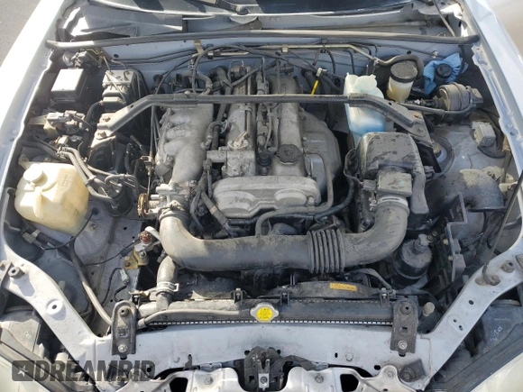 2003 Mazda MX-5 Miata Cloth z VIN JM1NB353X30311086, wystawiony jako Copart lot #57685445 z przebiegiem 141 634 mil mil oraz Szkoda całkowita • Salvage title. Historia ofert i sprzedaży dostępna na DreamBid. Obrazek 11.