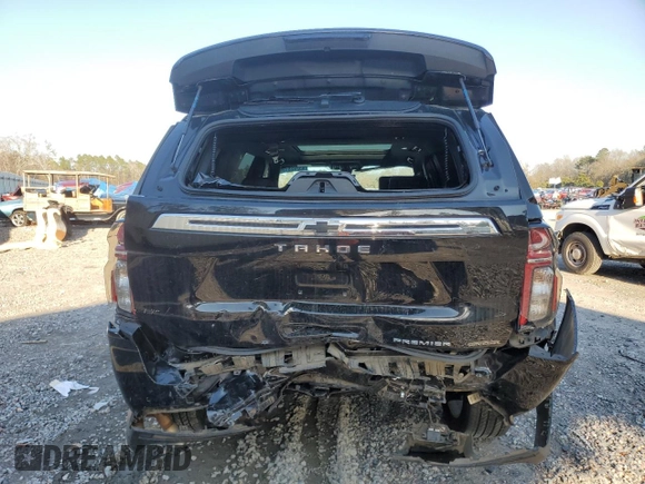 2021 Chevrolet Tahoe Premier with VIN 1GNSKSKD9MR321669, listed as a Copart auction lot 43282815 with 59,648 mi miles and Salvage title. Bid and sale history available at DreamBid. Image 6.