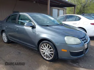 2009 Volkswagen Jetta Wolfsburg Edition with VIN 3VWRJ71K99M023071, listed as a IAAI auction lot 41853293 with 121,311 mi miles and . Bid and sale history available at DreamBid. Image 1.