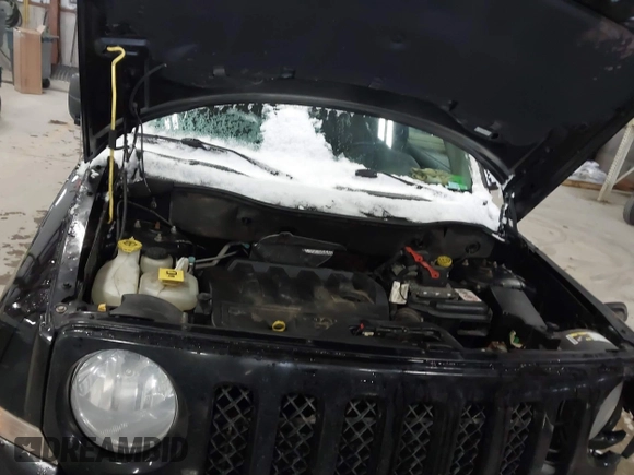 2014 Jeep Patriot Limited with VIN 1C4NJRCB8ED910340, listed as a IAAI auction lot 41396065 with 241,669 mi miles. Bid and sale history available at carsss.com. Image 10.