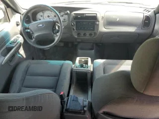 2001 Ford Explorer Sport Trac z VIN 1FMZU77E61UB01605, wystawiony jako Copart lot #56976175 z przebiegiem 106 313 mil mil oraz Tytuł czysty. Historia ofert i sprzedaży dostępna na DreamBid. Obrazek 8.