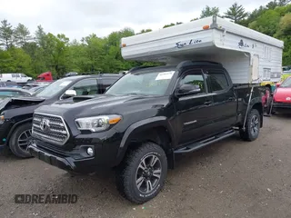 2017 Toyota Tacoma SR5 with VIN 3TMDZ5BN7HM017433, listed as a IAAI auction lot 42303178 with 69,510 mi miles and . Bid and sale history available at DreamBid. Image 2.
