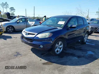 2009 Acura RDX with VIN 5J8TB18249A003611, listed as a IAAI auction lot 41781094 with 168,259 mi miles and . Bid and sale history available at carsss.com. Image 18.