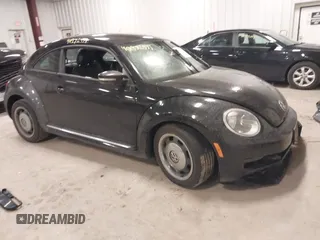2012 Volkswagen Beetle 2.5L PZEV with VIN 3VWJP7AT3CM623533, listed as a IAAI auction lot 40972471 with 95,906 mi miles. Bid and sale history available at carsss.com. Image 1.