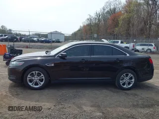 2013 Ford Taurus SEL with VIN 1FAHP2E87DG220389, listed as a IAAI auction lot 41930118 with 128,324 mi miles and . Bid and sale history available at carsss.com. Image 14.
