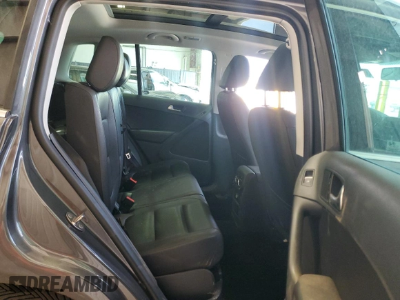 2015 Volkswagen Tiguan SE z VIN WVGBV7AX0FW588451, wystawiony jako Copart lot #51005345 z przebiegiem 104 553 mil mil oraz Szkoda całkowita • Salvage title. Historia ofert i sprzedaży dostępna na DreamBid. Obrazek 11.
