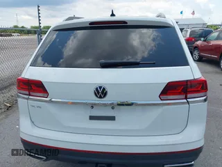2021 Volkswagen Atlas SE с VIN 1V2WR2CA5MC569901, выставлен на аукционе IAAI как лот 42397774 с пробегом 75 802 миль миль и . История ставок и продаж доступна на DreamBid. Изображение 16.