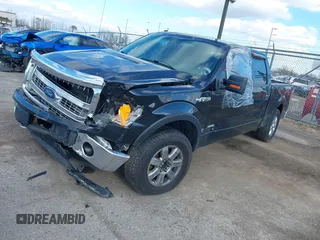 2013 Ford F-150 XL with VIN 1FTFW1ET0DFB39467, listed as a IAAI auction lot 40770557 with 166,779 mi miles and . Bid and sale history available at DreamBid. Image 2.