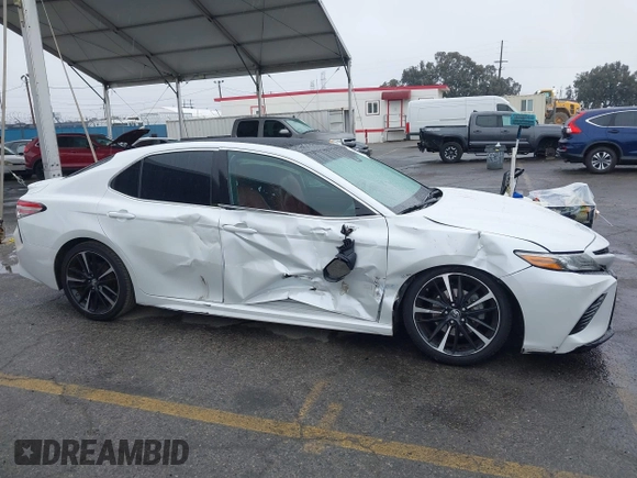2018 Toyota Camry XSE with VIN 4T1BZ1HK8JU019394, listed as a IAAI auction lot 41492529 with 107,745 mi miles and . Bid and sale history available at DreamBid. Image 12.