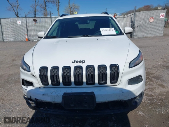 2014 Jeep Cherokee Latitude with VIN 1C4PJMCS9EW309289, listed as a IAAI auction lot 42003252 with 99,360 mi miles and . Bid and sale history available at DreamBid. Image 12.