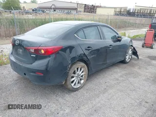 2017 Mazda 3 Touring with VIN 3MZBN1V71HM128842, listed as a IAAI auction lot 42314280 with 139,469 mi miles and . Bid and sale history available at DreamBid. Image 4.