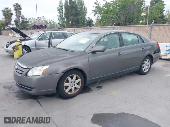 2007 Toyota Avalon XL with VIN 4T1BK36B47U175248, listed as a IAAI auction lot 42126427 with 144,284 mi miles. Bid and sale history available at carsss.com. Image 2.