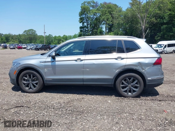 2022 Volkswagen Tiguan SE with VIN 3VV2B7AX2NM074369, listed as a IAAI auction lot 42522561 with 47,752 mi miles and . Bid and sale history available at DreamBid. Image 14.
