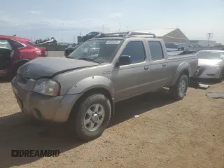 2003 Nissan Frontier SVE with VIN 1N6MD29Y63C469149, listed as a Copart auction lot 64320295 with 101,360 mi miles and Salvage title. Bid and sale history available at DreamBid. Image 1.
