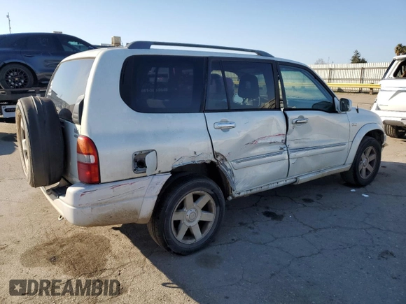 2002 Suzuki XL7 Standard z VIN JS3TX92VX24118298, wystawiony jako Copart lot #42781415 z przebiegiem 312 010 mil mil oraz Szkoda całkowita • Salvage title. Historia ofert i sprzedaży dostępna na DreamBid. Obrazek 3.