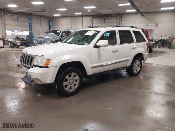 2009 Jeep Grand Cherokee Limited with VIN 1J8GR58K29C553812, listed as a IAAI auction lot 41520065 with 203,595 mi miles. Bid and sale history available at carsss.com. Image 2.