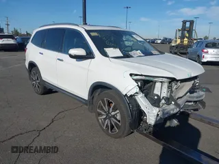 2022 Honda Pilot Touring 7-Passenger с VIN 5FNYF5H61NB016224, выставлен на аукционе IAAI как лот 41569268 с пробегом 20 613 миль миль и . История ставок и продаж доступна на DreamBid. Изображение 1.