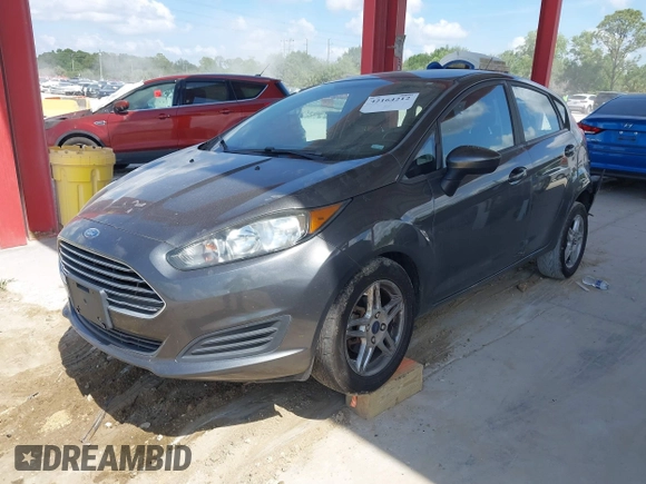 2019 Ford Fiesta SE with VIN 3FADP4EJ9KM156565, listed as a IAAI auction lot 42164212 with 133,759 mi miles and . Bid and sale history available at DreamBid. Image 2.