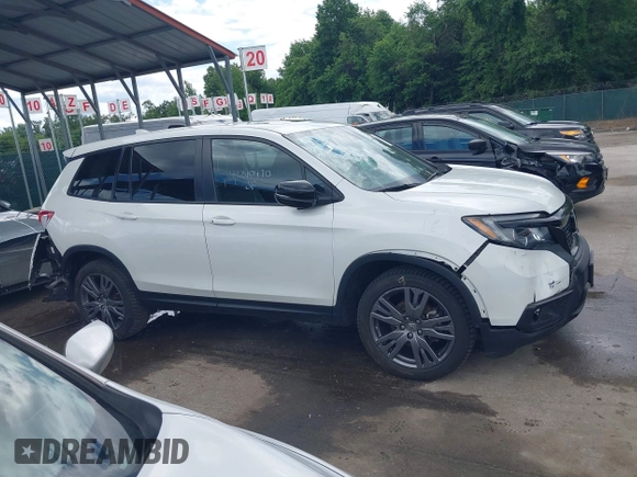 2021 Honda Passport EX-L with VIN 5FNYF8H54MB041738, listed as a IAAI auction lot 42310470 with 52,409 mi miles and . Bid and sale history available at DreamBid. Image 13.