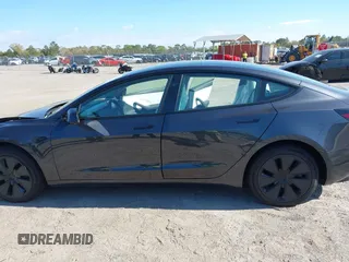 2025 Tesla Model 3 Long Range with VIN 5YJ3E1EA2SF910890, listed as a IAAI auction lot 41791583 with Not Provided miles and . Bid and sale history available at DreamBid. Image 13.