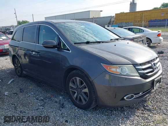 2014 Honda Odyssey Touring with VIN 5FNRL5H99EB111685, listed as a IAAI auction lot 42141227 with 183,484 mi miles and . Bid and sale history available at DreamBid. Image 1.