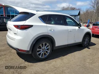 2020 Mazda CX-5 Grand Touring with VIN JM3KFBDM9L1803881, listed as a Copart auction lot 52822395 with 49,604 mi miles and Salvage Title. Bid and sale history available at carsss.com. Image 3.